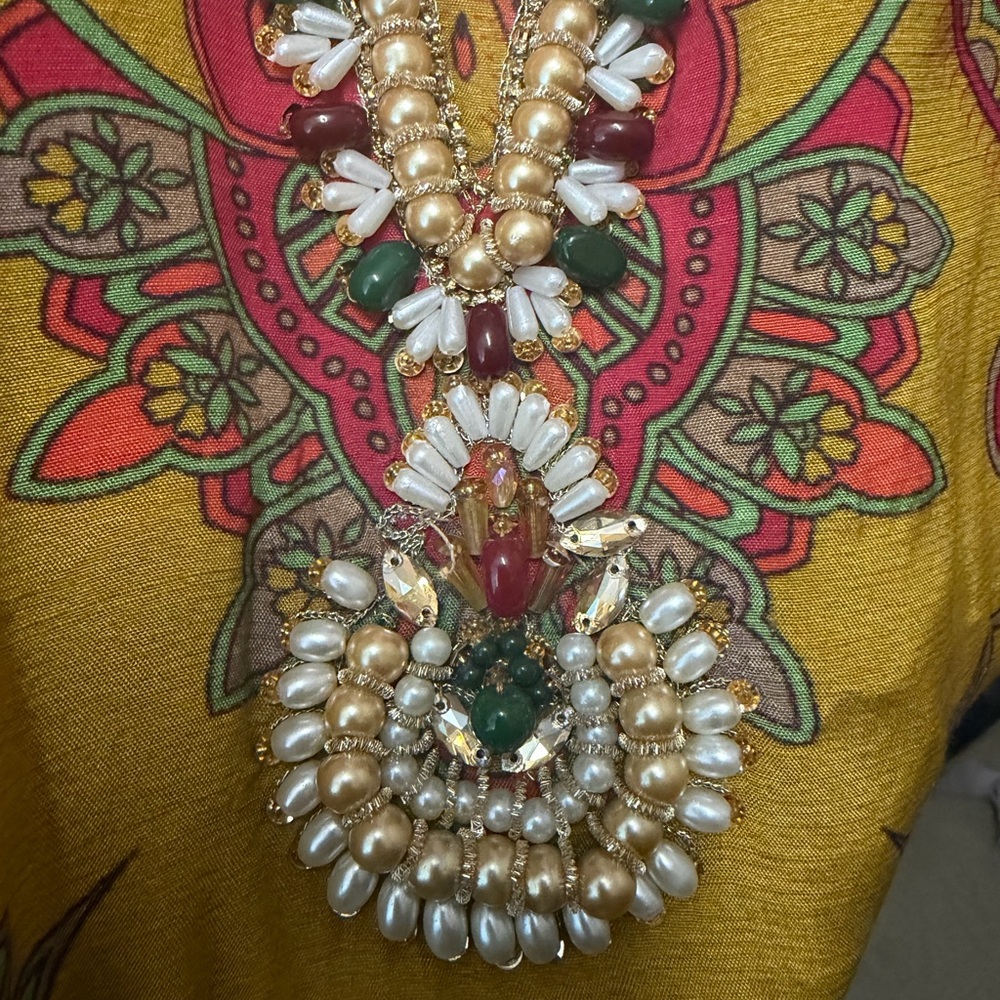 Pakistani kaftan Dress with Gold Bead & Green-Red Accent Embellishment.